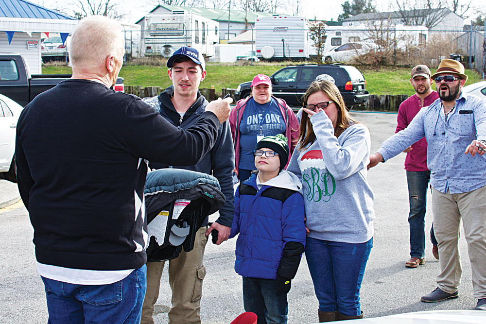 Holiday ride Dealers gives car to Winchester family Winchester Sun